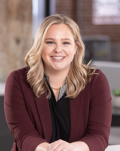 Portrait of a smiling person in business attire